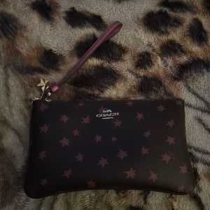 Large Coach wristlet wallet, brown and purple with star print